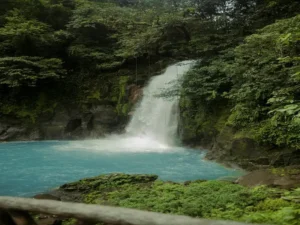 Rio Celeste waterfall with turquoise water in Costa Rica