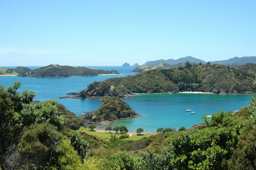 Turquoise waters and forested islets in the Bay of Islands, North Island