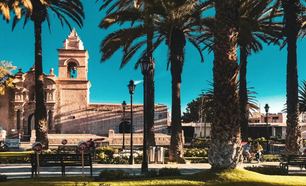 Colonial cathedral and palm trees in Arequipa's main plaza, Peru's White City