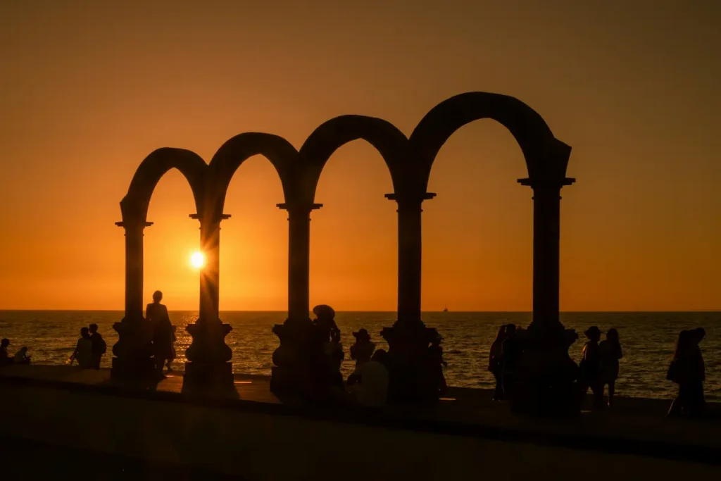 Los Arcos monument on the Puerto Vallarta malecón at sunset, Mexico's Pacific coast