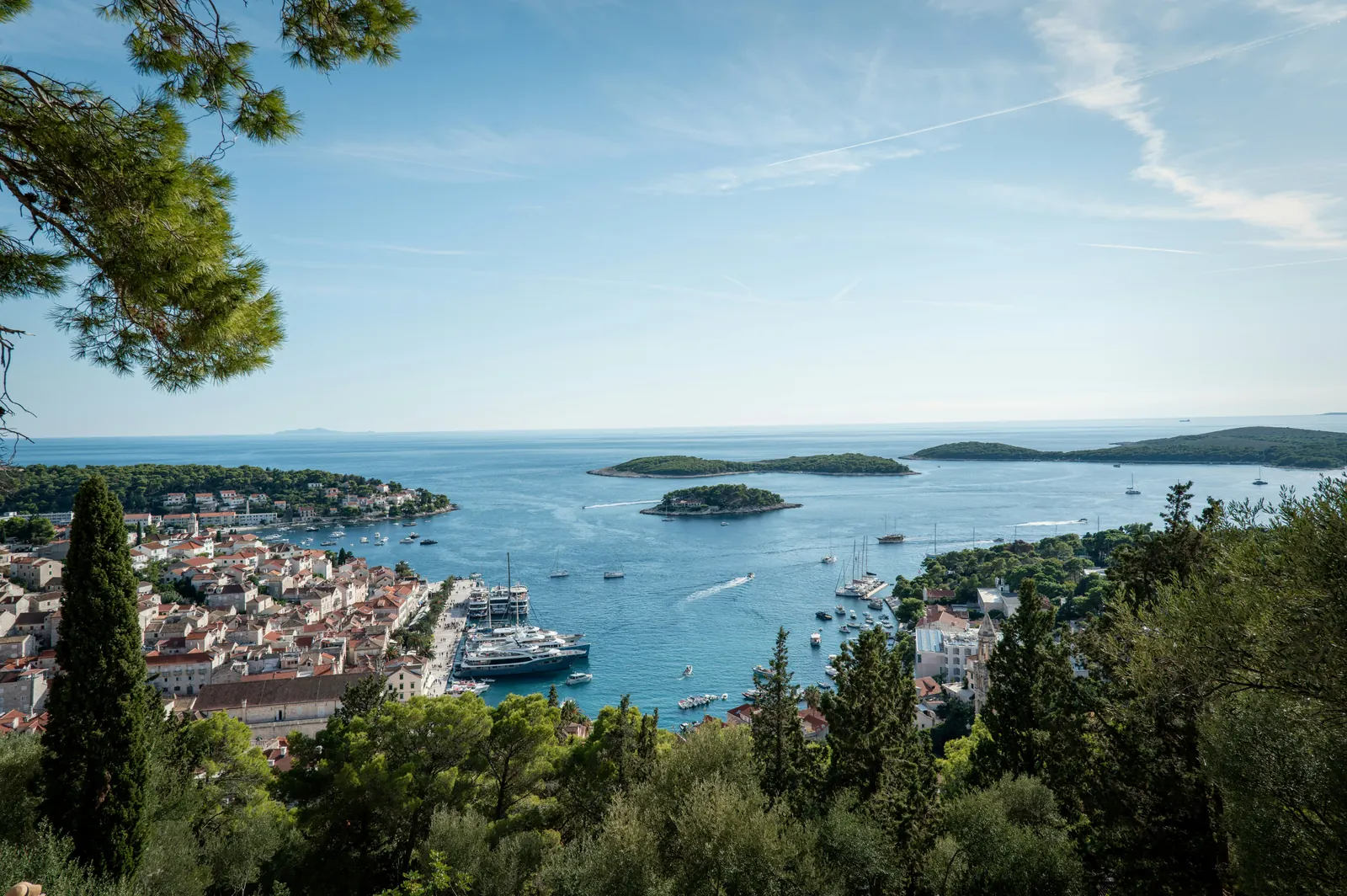 Aerial view of Hvar’s old town harbor with the Pakleni Islands in the bay