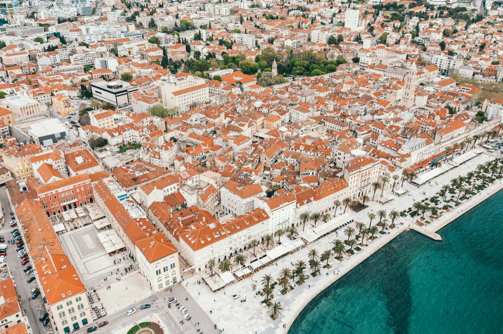 Aerial view of Split’s old town, cathedral bell tower, and Riva waterfront promenade