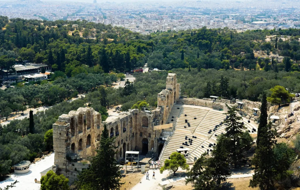 Aerial view of the Odeon of Herodes Atticus with Athens in the background