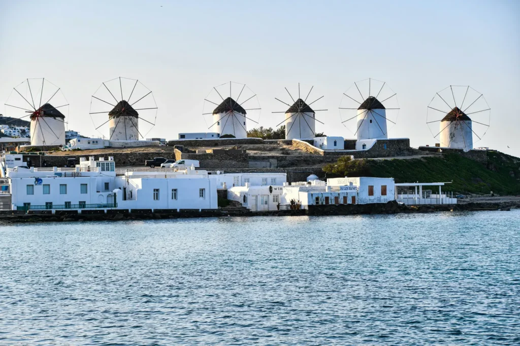 Traditional windmills on Mykonos island at dusk