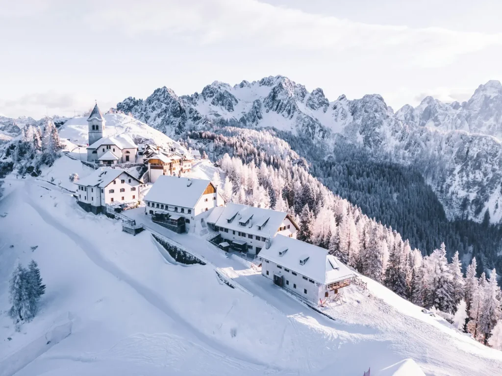 Snow-covered alpine village in the Dolomites in winter
