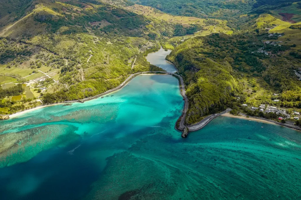 Aerial view of a coastal lagoon and coastline road in Mauritius