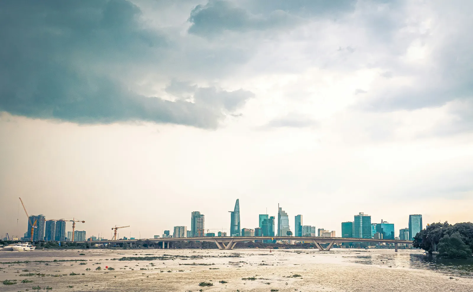 Ho Chi Minh City’s skyline viewed across the Saigon River at dusk